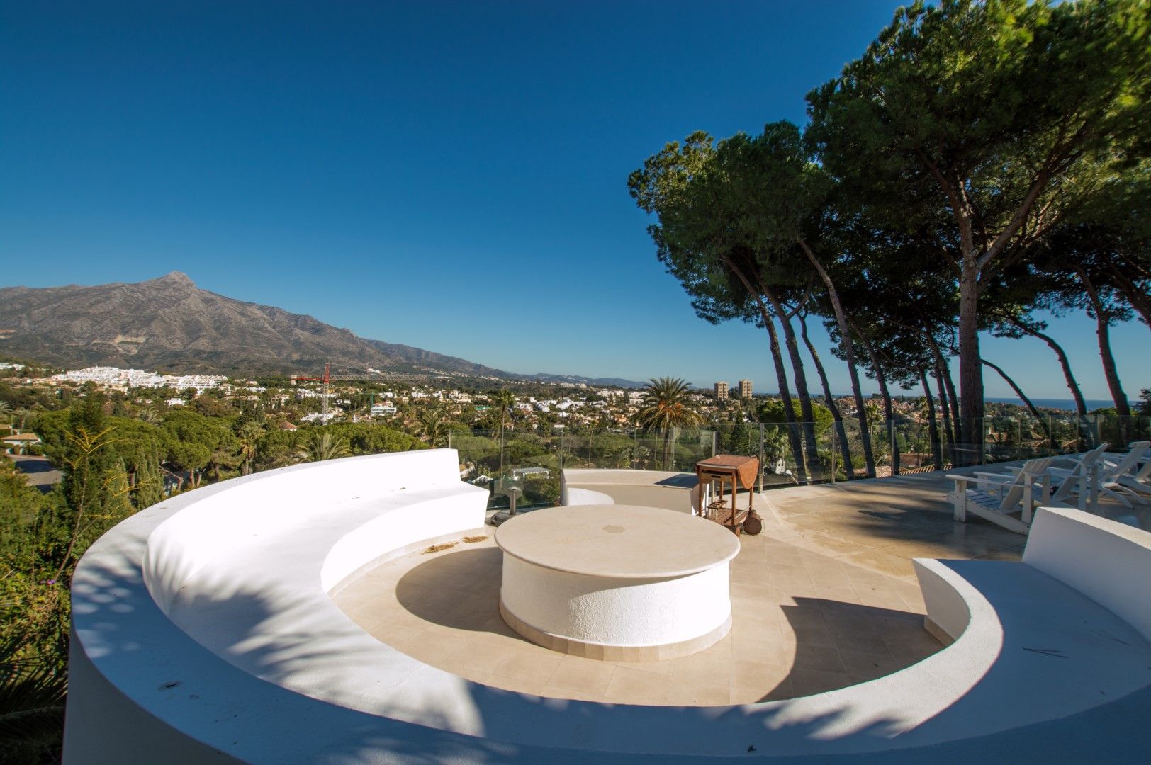 Luxury contemporary villa with spectacular sea and mountain views for short-term rent in Nueva Andalucia, Costa del Sol