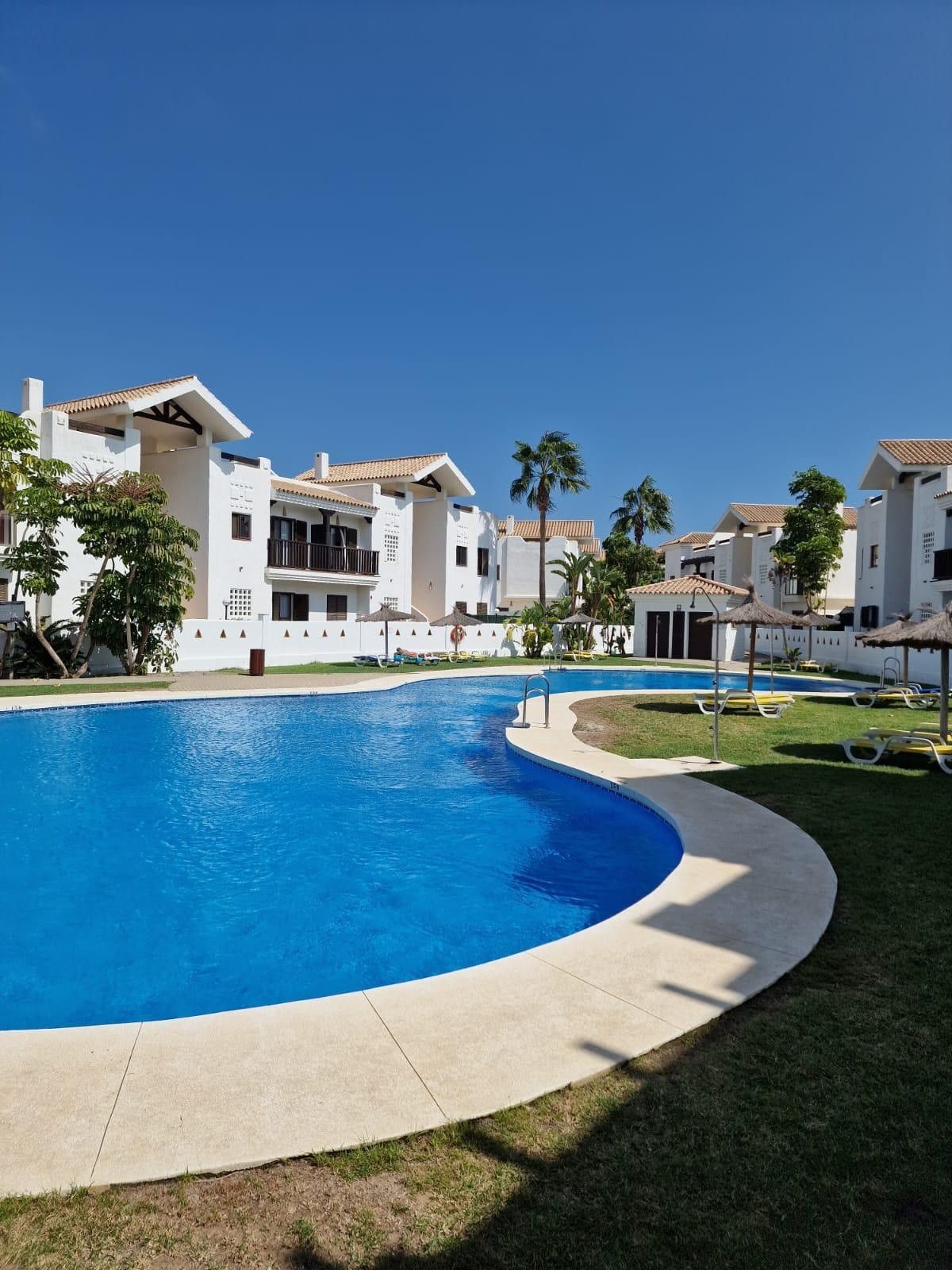 Stylish Ground-Floor Apartment with Spacious Terrace and Garden in La Alcaidesa.