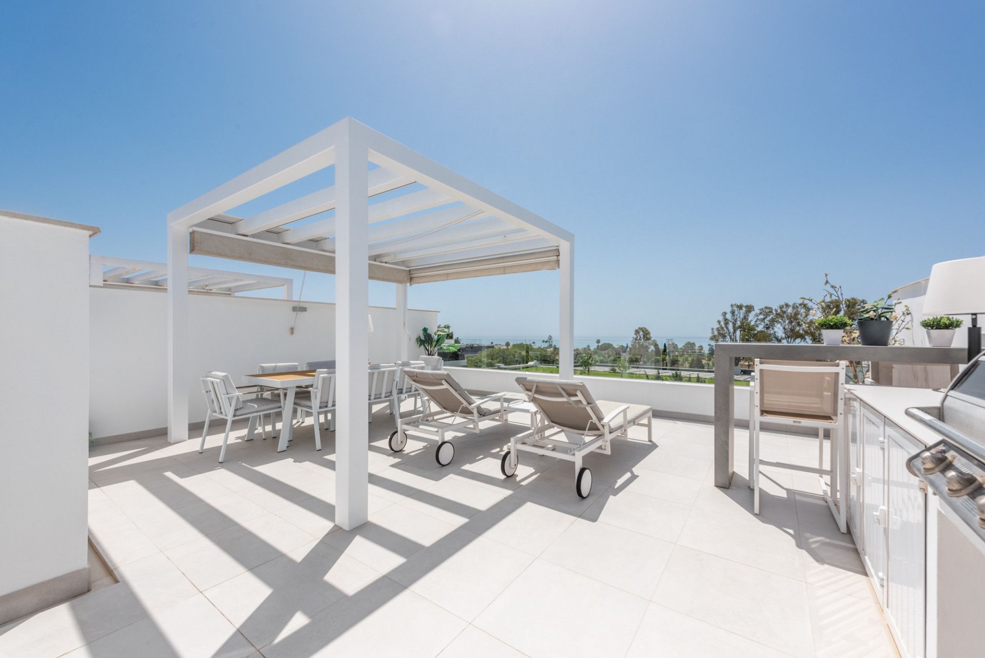 Stunning penthouse with fabulous terraces, sea views and elegant design. Walking distance to all amenities and the beach!