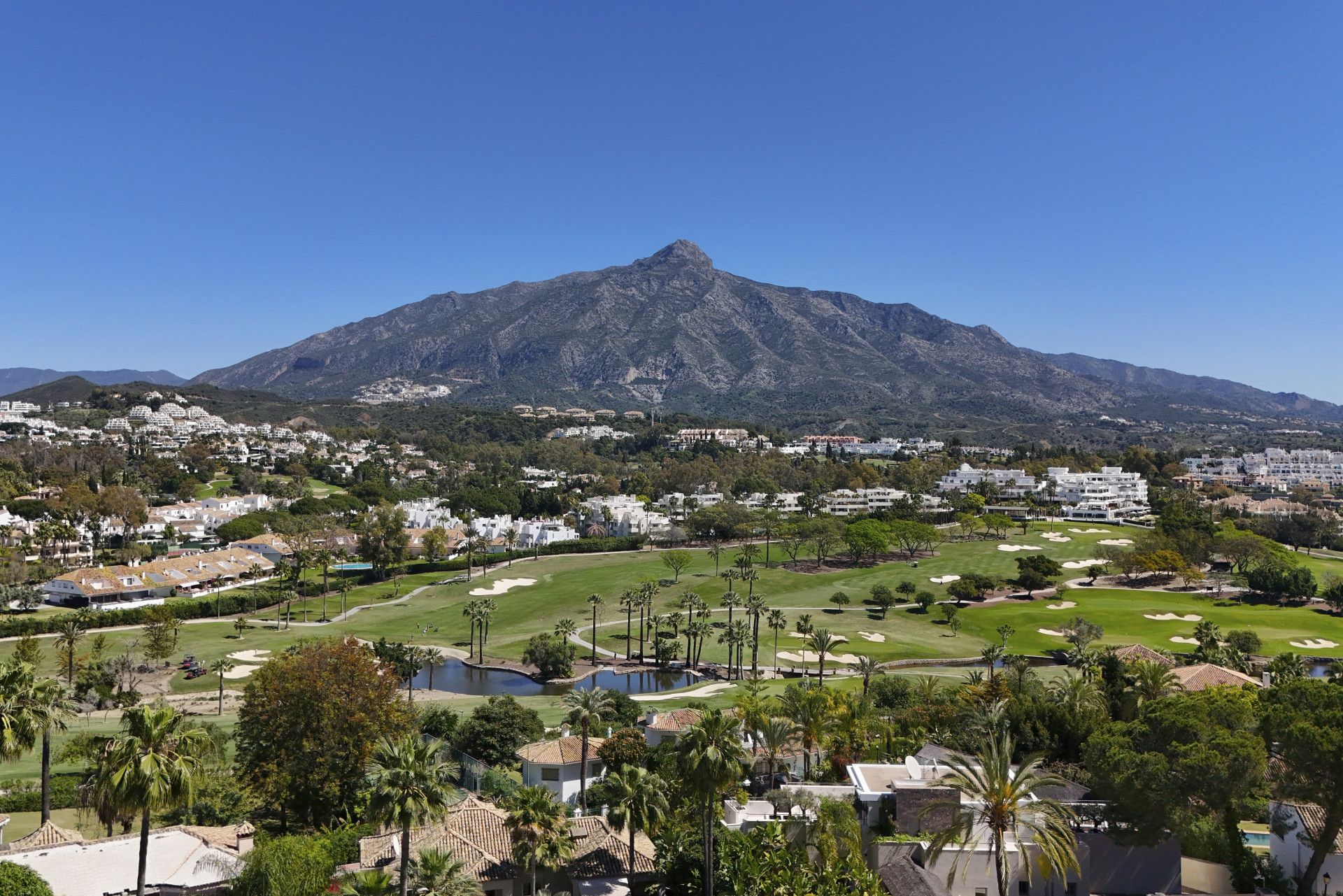 Largest 2 bed in secure community with panoramic mountain & golf views